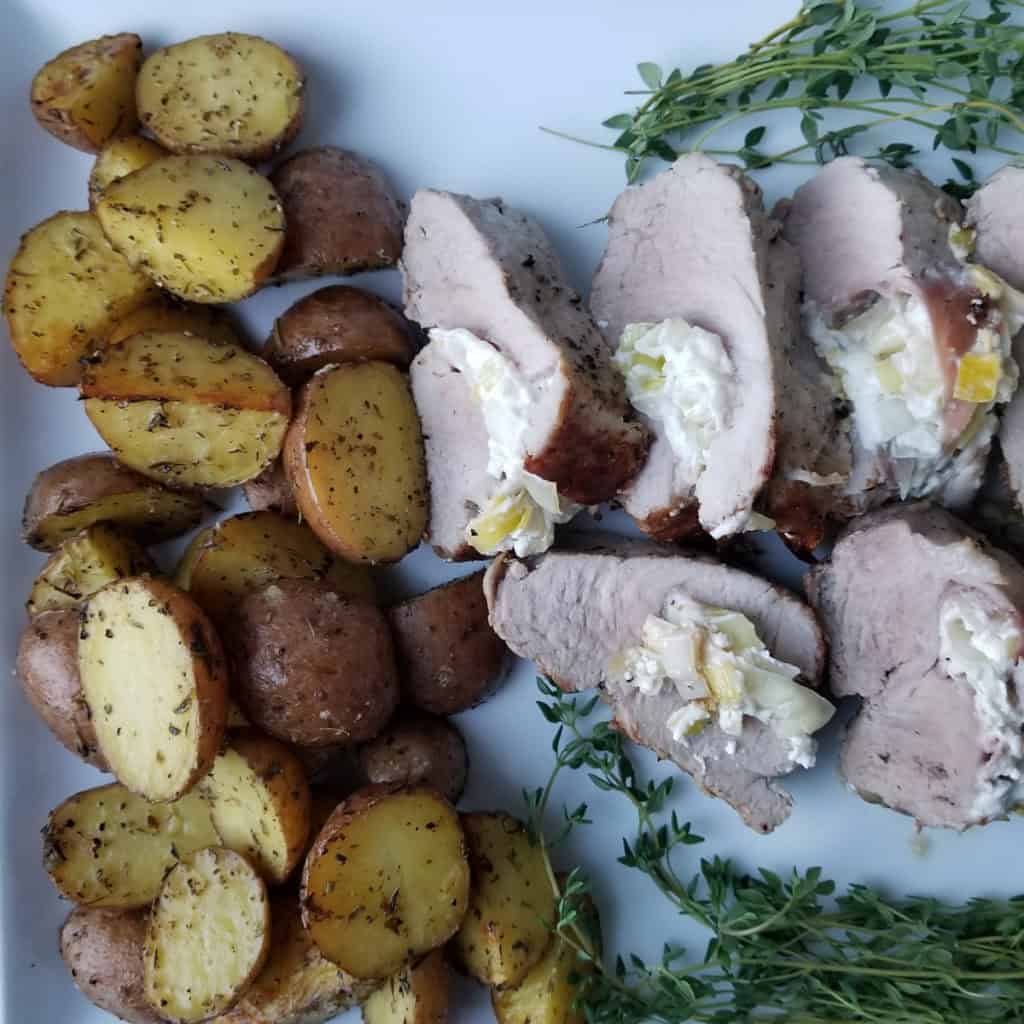 Pork Tenderloin Stuffed with Goat Cheese, Leeks and Prosciutto